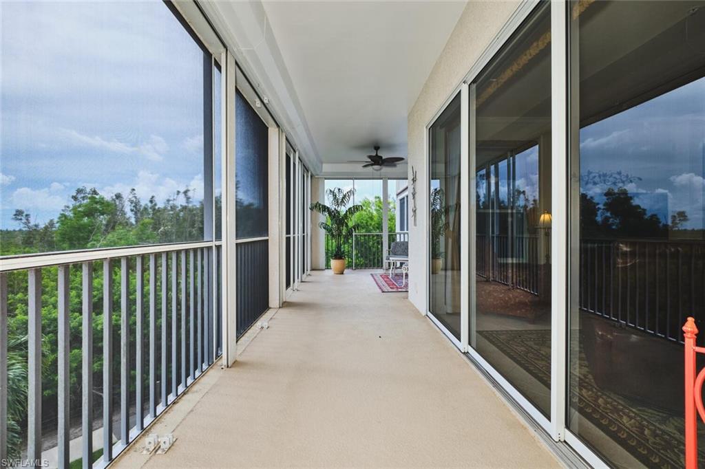Balcony featuring a ceiling fan