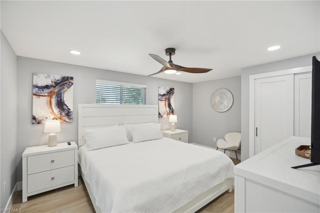 Bedroom featuring recessed lighting, light wood-type flooring, and a ceiling fan