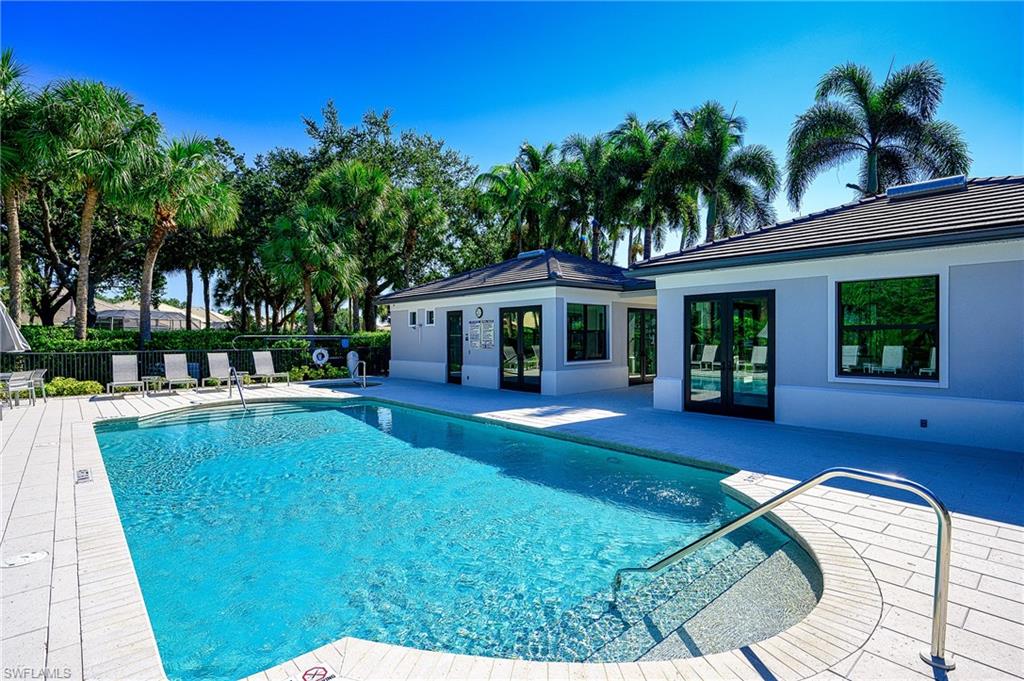 View of swimming pool featuring a patio and french doors