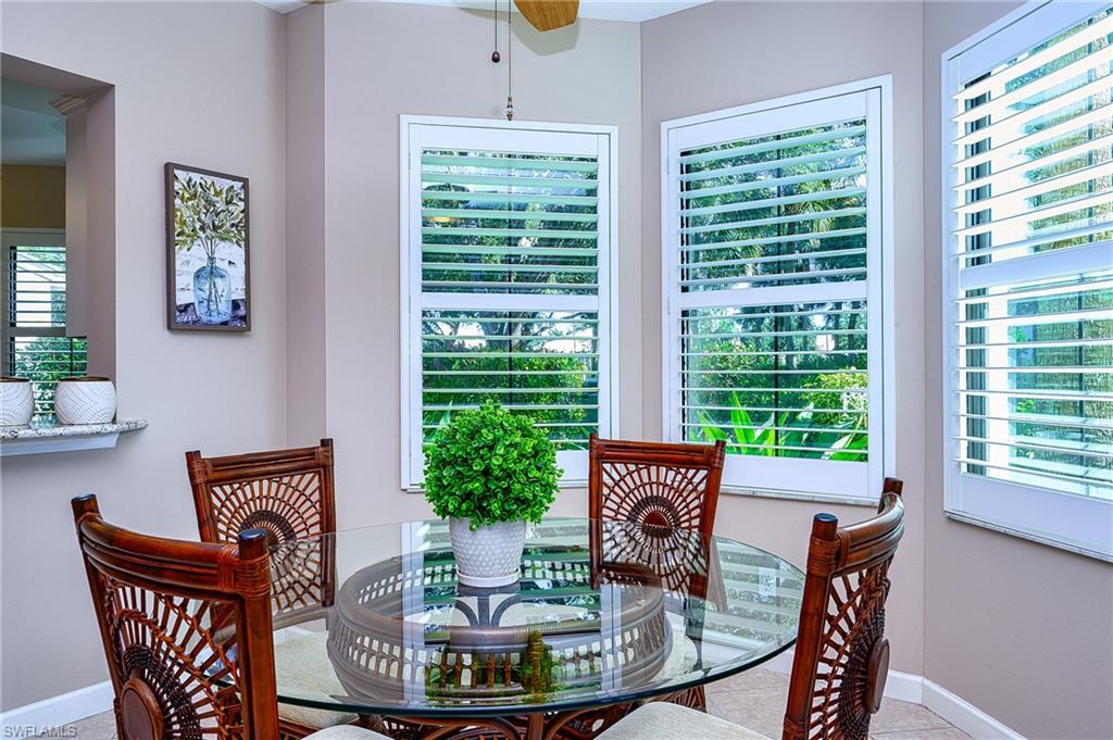 Dining area featuring a healthy amount of sunlight and ceiling fan