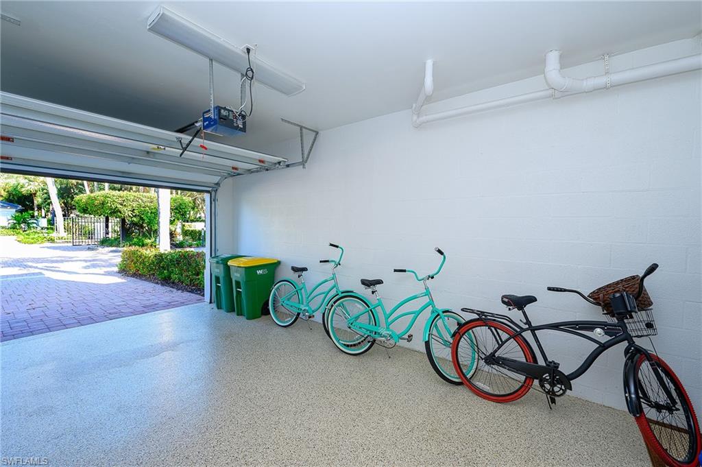 Garage featuring a garage door opener