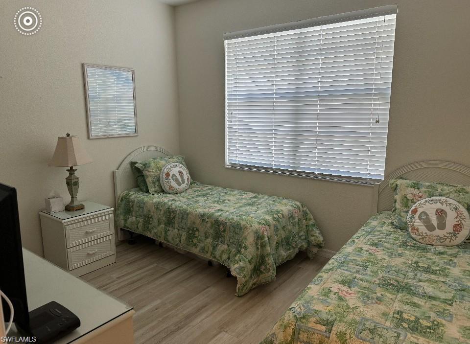 Bedroom featuring wood finished floors