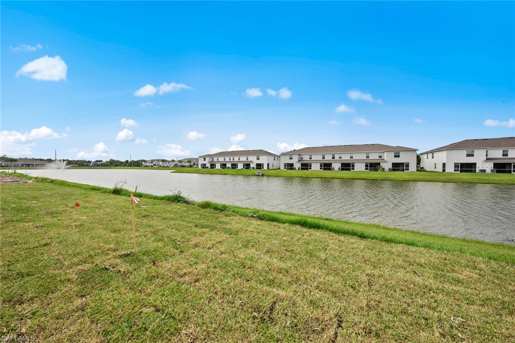 Water view featuring nearby suburban area