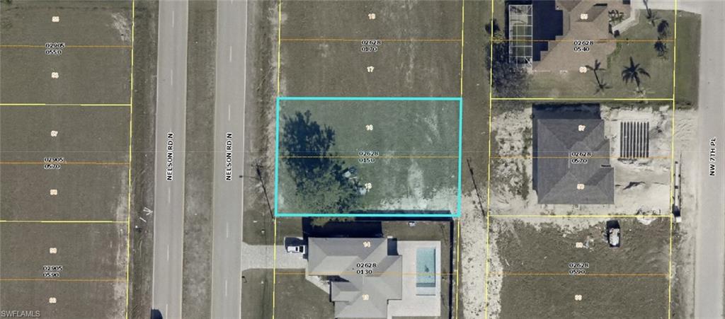 Aerial map of property and surrounding area featuring property parcel outlined