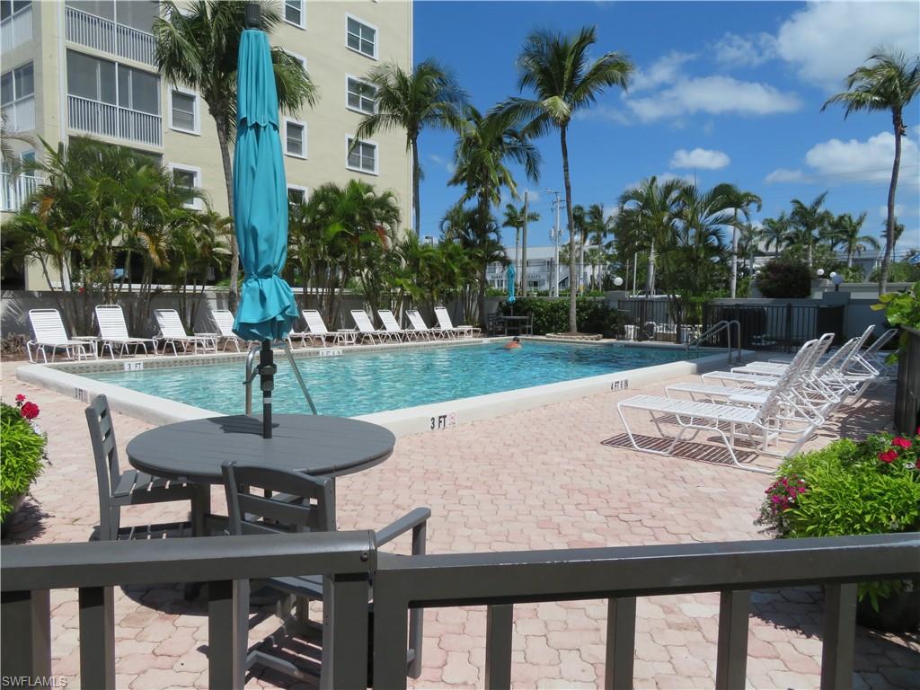 Community pool with a patio area