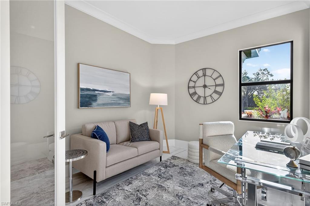 Home office featuring ornamental molding