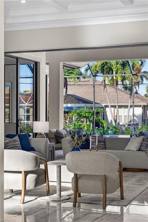 View of patio / terrace featuring outdoor lounge area and glass enclosure