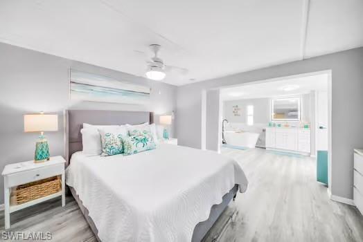 Bedroom with light wood-style flooring and ceiling fan