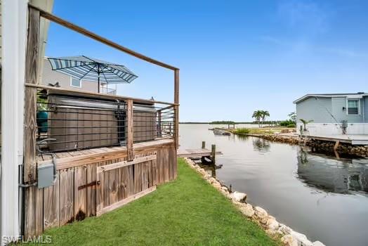 Dock featuring a water view