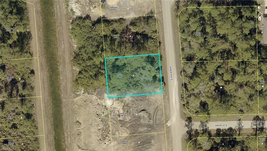 Aerial overview of property's location featuring property parcel outlined
