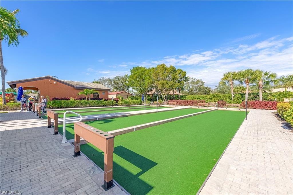 View of property's community with a bocce ball area