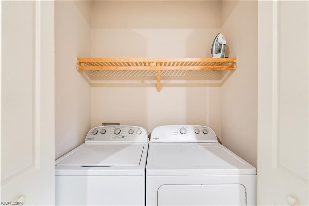 Laundry area featuring separate washer and dryer
