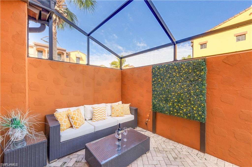 View of patio / terrace featuring a sunroom, a lanai, and an outdoor hangout area