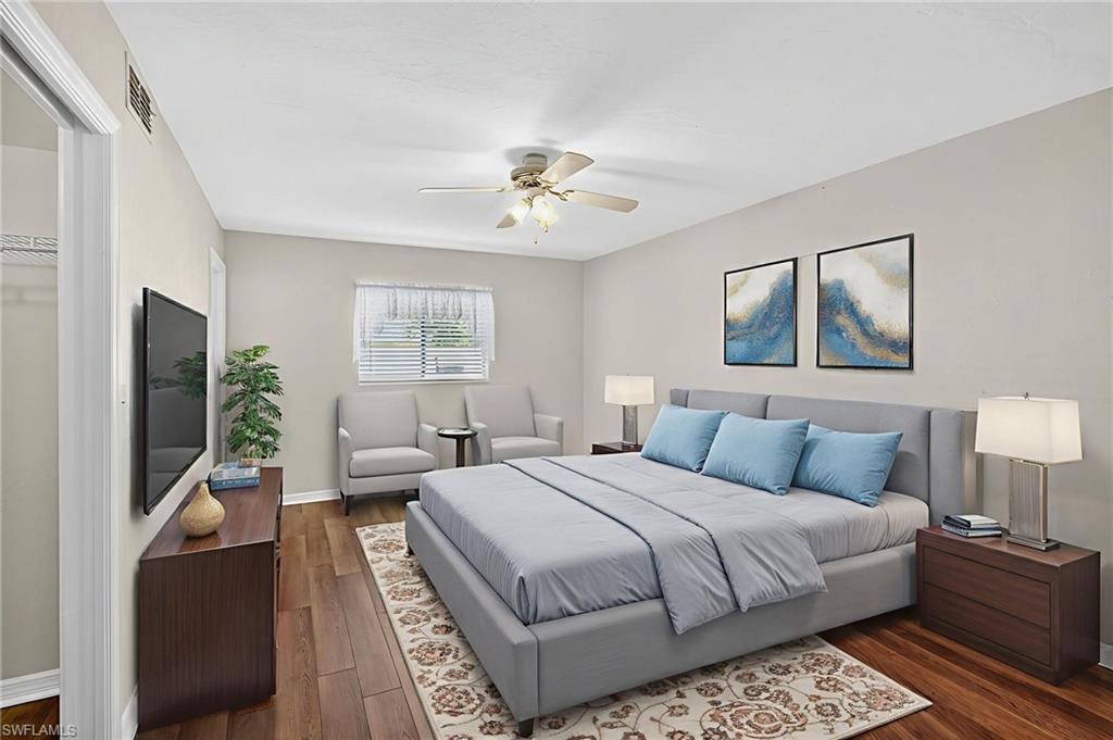 Bedroom featuring wood finished floors and ceiling fan