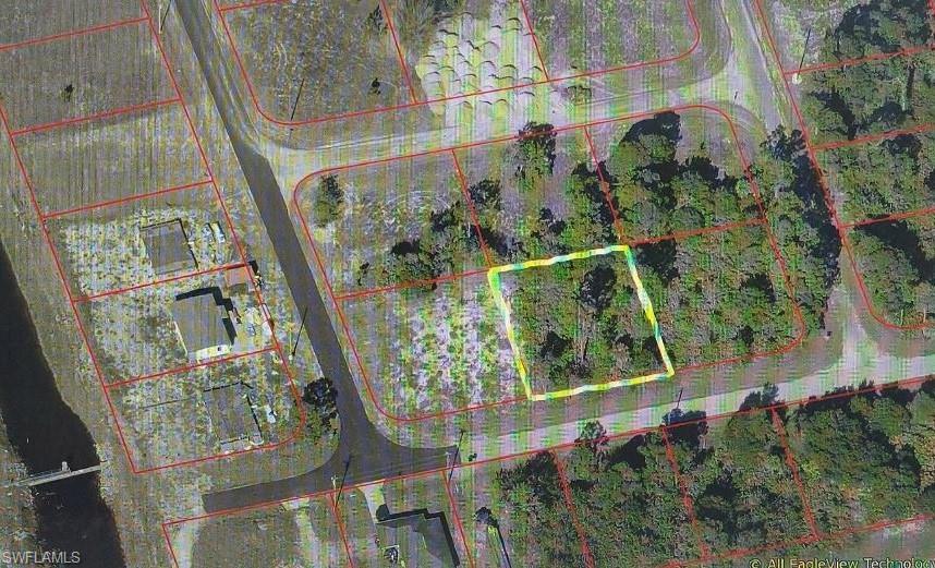 Aerial overview of property's location with property parcel outlined