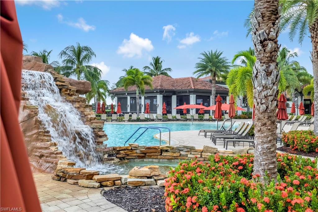 Community pool featuring a patio