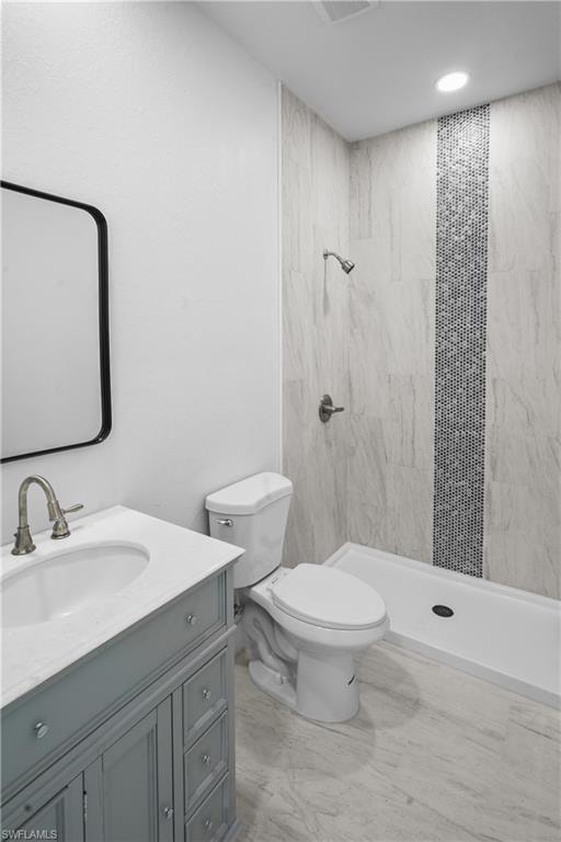 Full bath with vanity and a stall shower