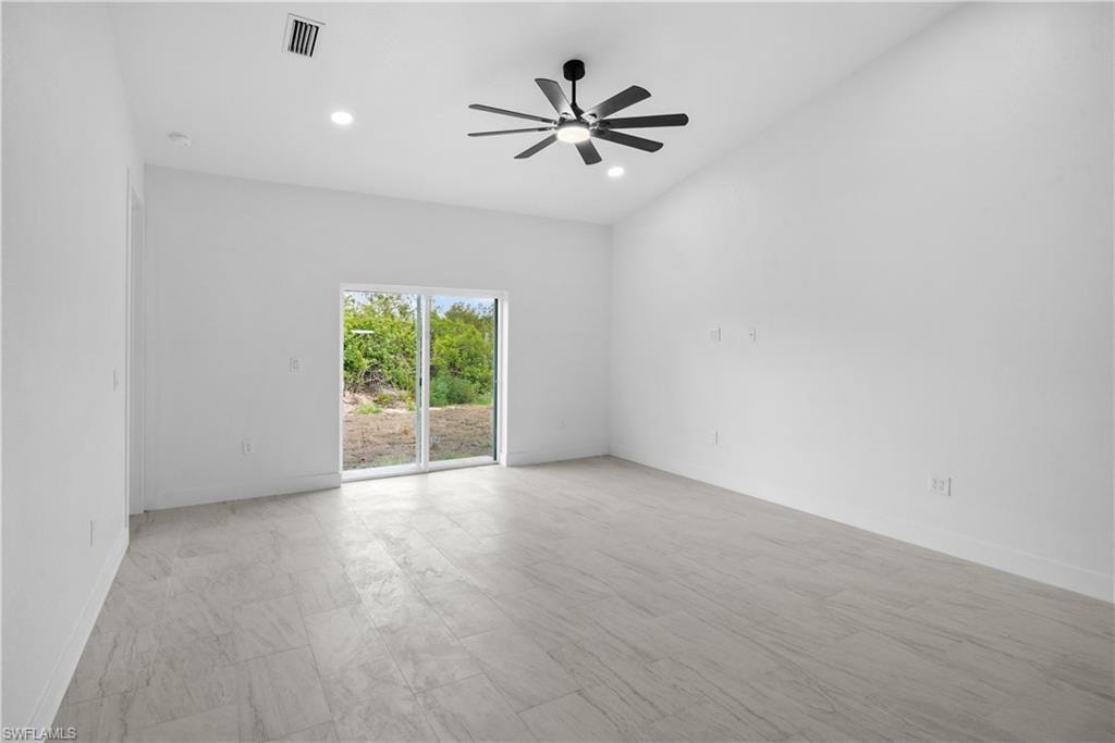Spare room featuring recessed lighting, light wood-style flooring, and ceiling fan