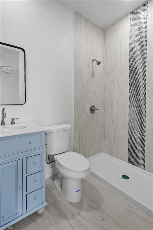 Bathroom with vanity and a shower stall