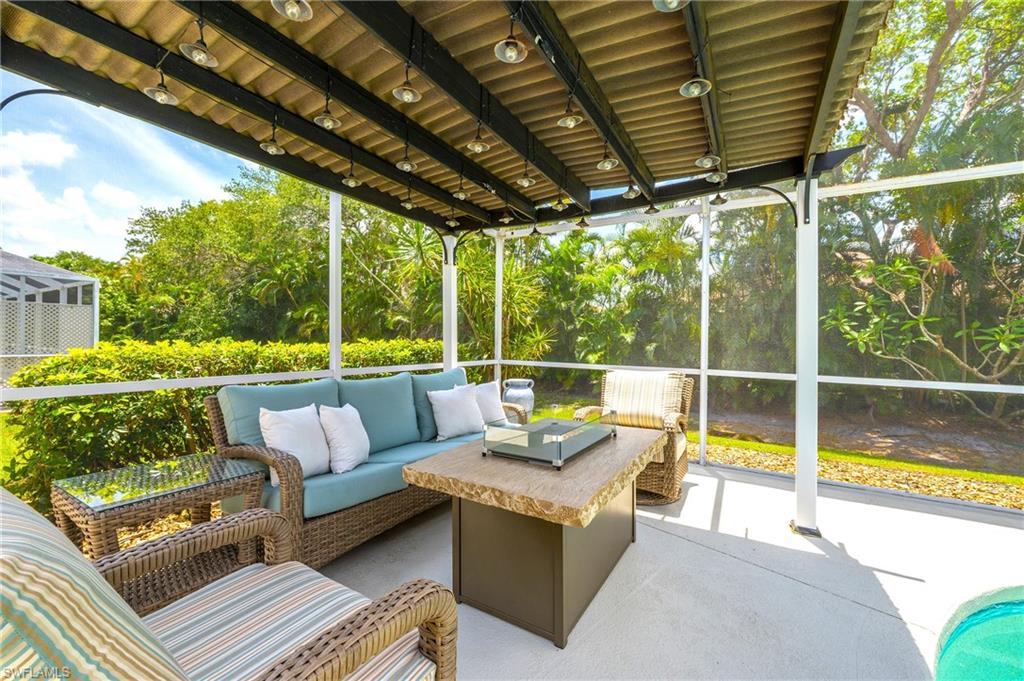 View of patio / terrace featuring outdoor lounge area and view of scattered trees