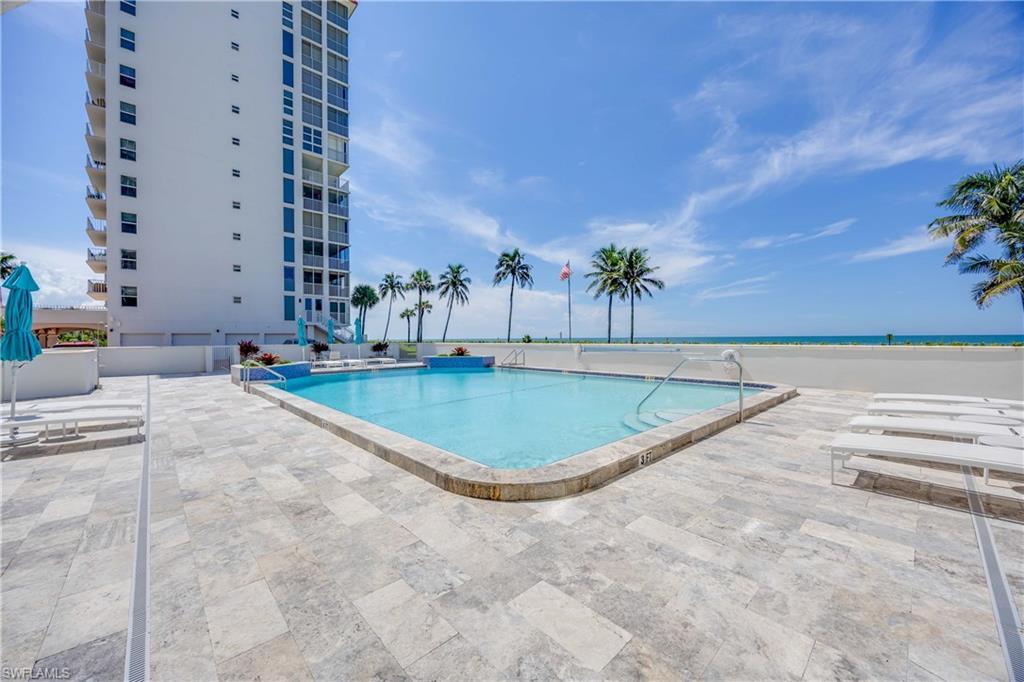 Community pool with a hot tub