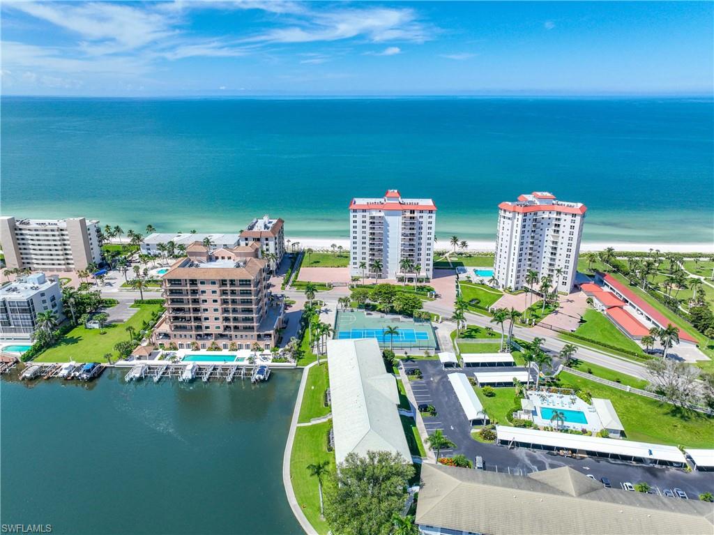 Aerial view of a large body of water and a pool area