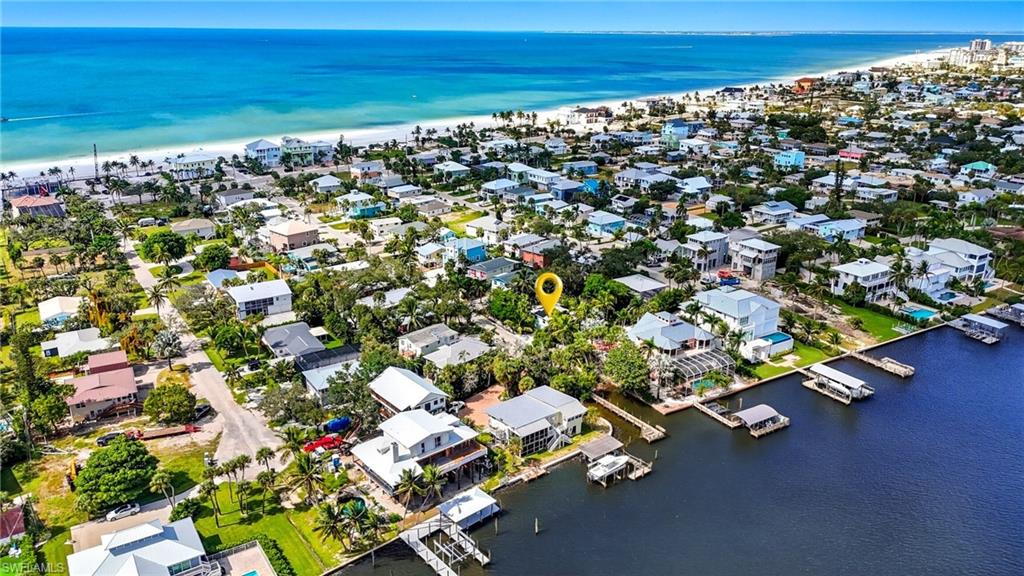 Drone / aerial view of waterfront with a beach - Virtually Edited Image