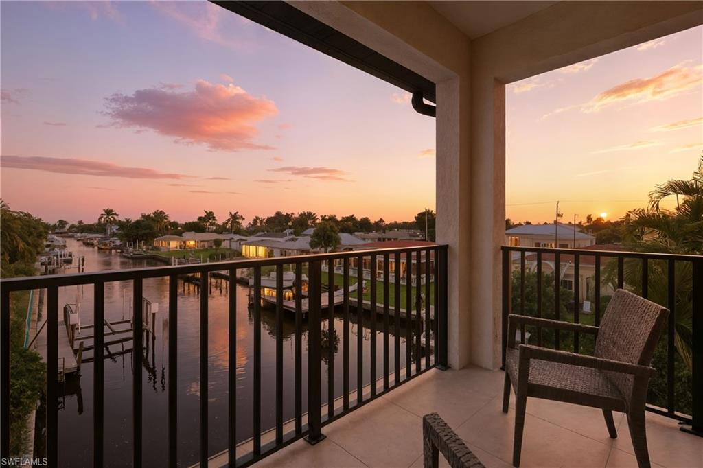 Balcony at dusk with a water view