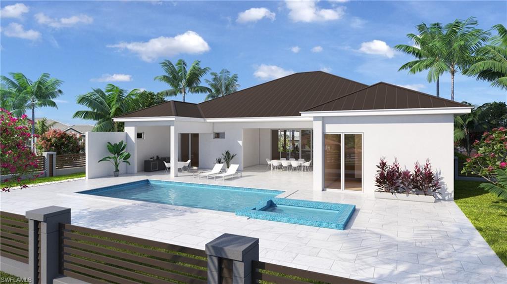 Back of property with stucco siding, an outdoor pool, a patio, a metal roof, and a standing seam roof
