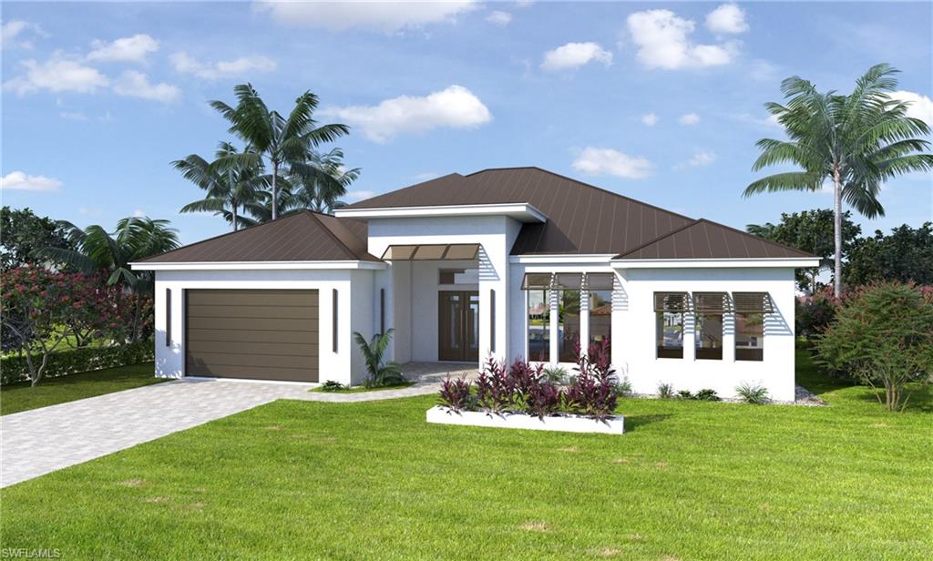 View of front of property with a front yard, decorative driveway, and stucco siding