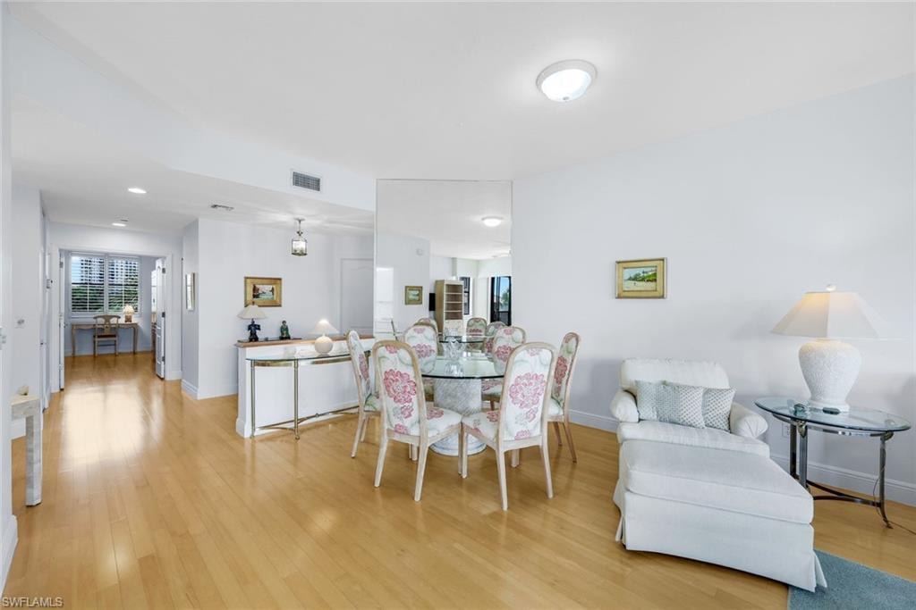 Dining space with light wood finished floors and baseboards