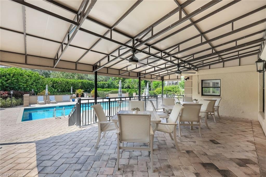 Community pool featuring a patio area