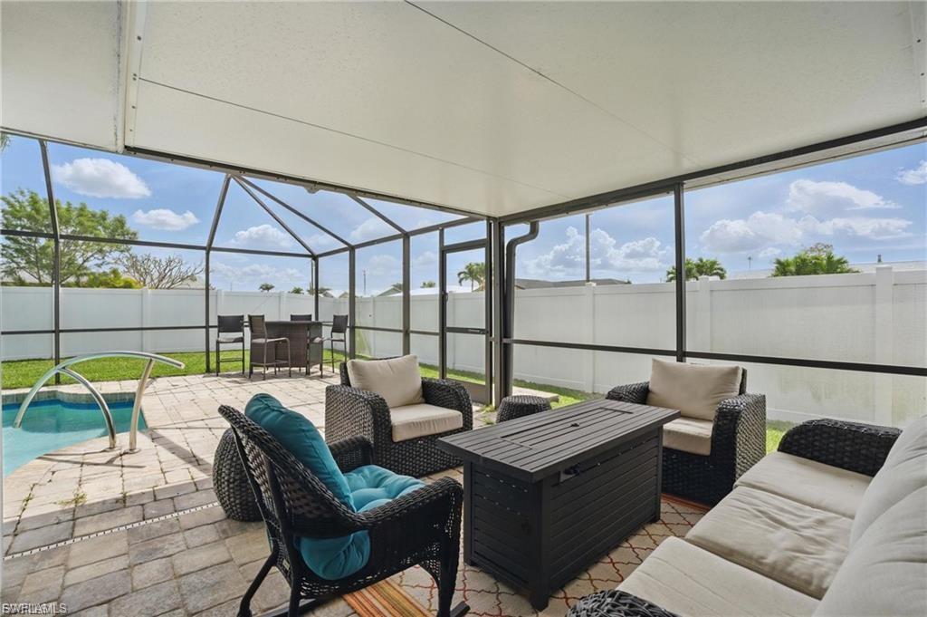 Sunroom / solarium with an outdoor hangout area and a patio area