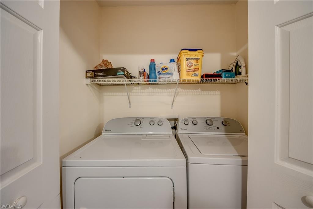 Washroom featuring separate washer and dryer