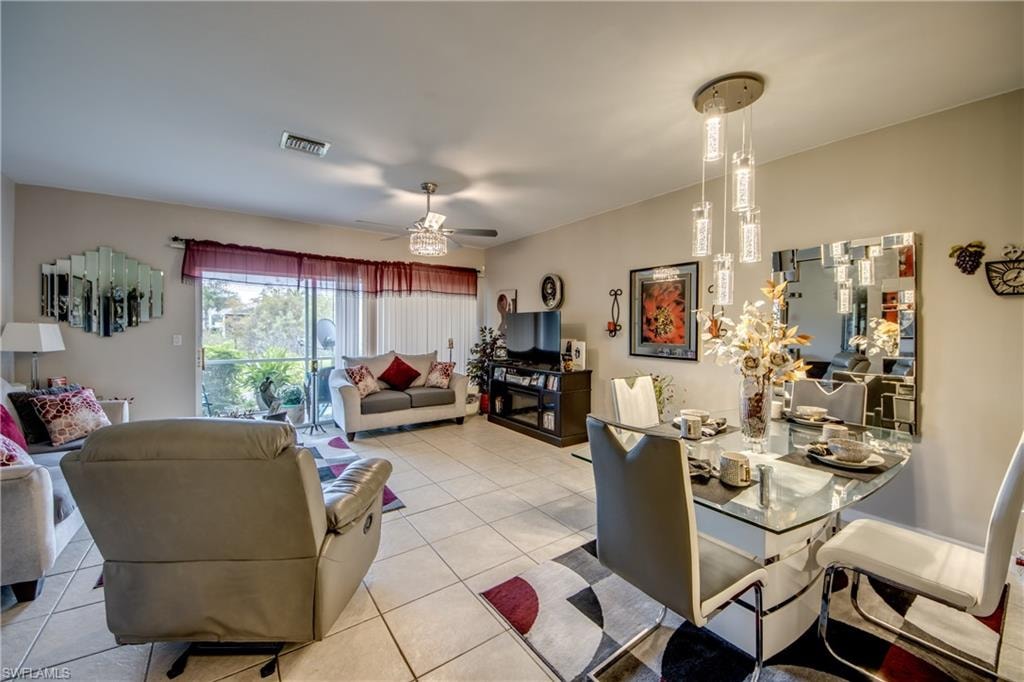 Tiled dining area with ceiling fan