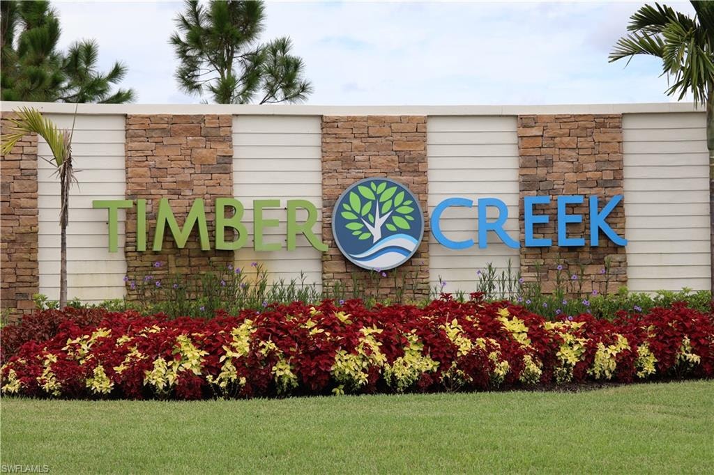 Community sign featuring a yard
