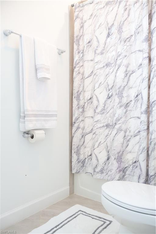 1st Floor Full bathroom with shower / bath combination with curtain