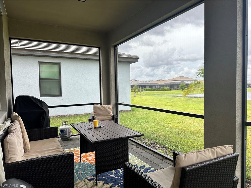 First floor lanai with an seating hangout area