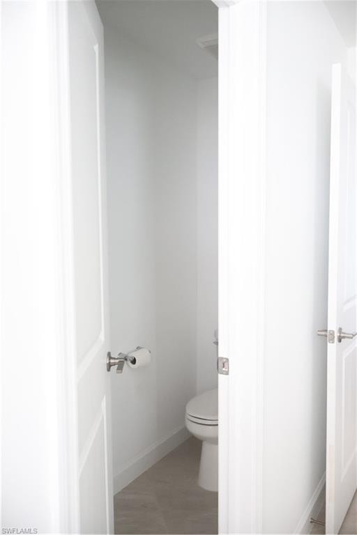 Master Bathroom: toilet area with privacy door