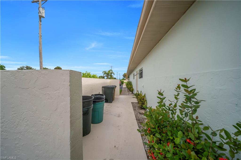 View of side of property with stucco siding