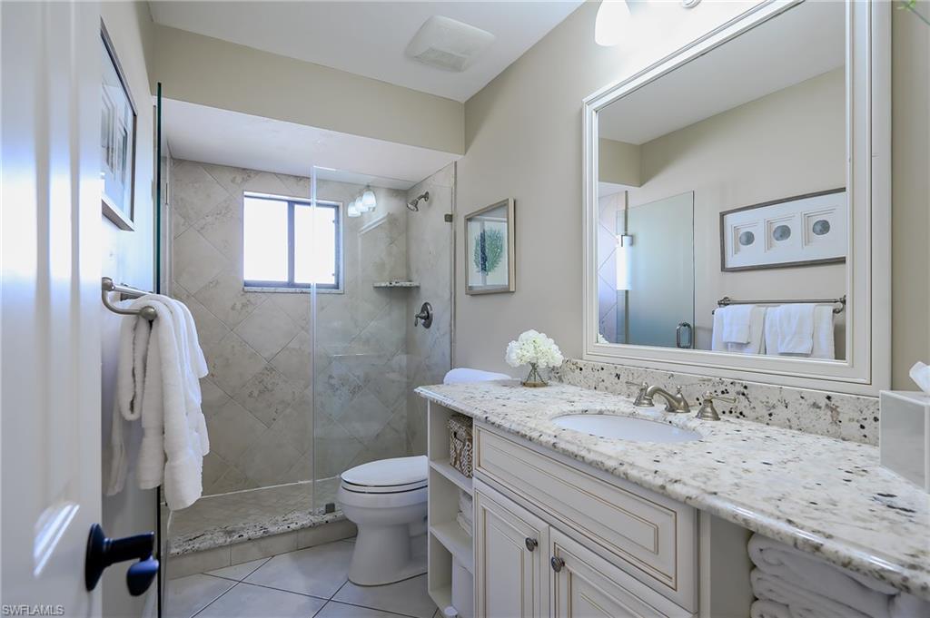 2nd bathroom with walk-in shower located near the bedrooms.