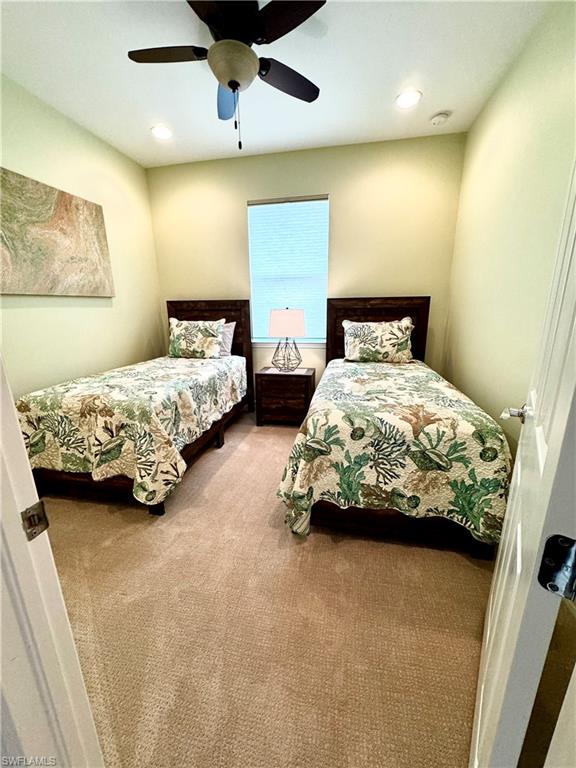 Bedroom featuring carpet flooring, recessed lighting, and ceiling fan