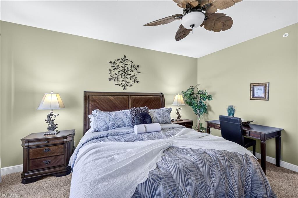 Bedroom with carpet and ceiling fan