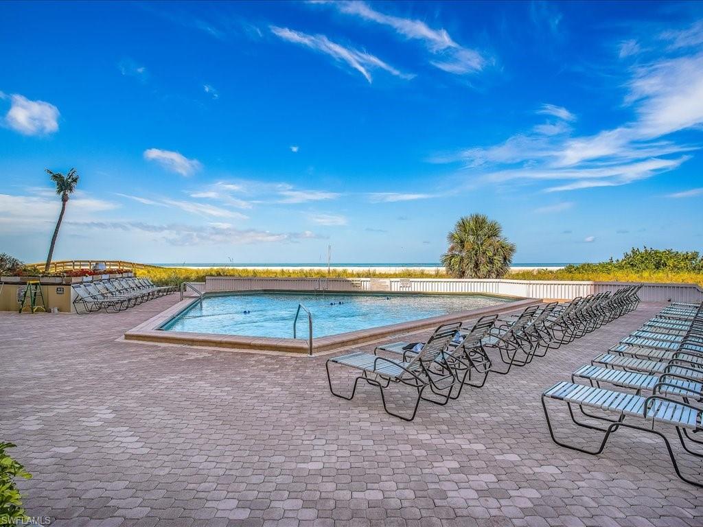 Community pool featuring a patio area