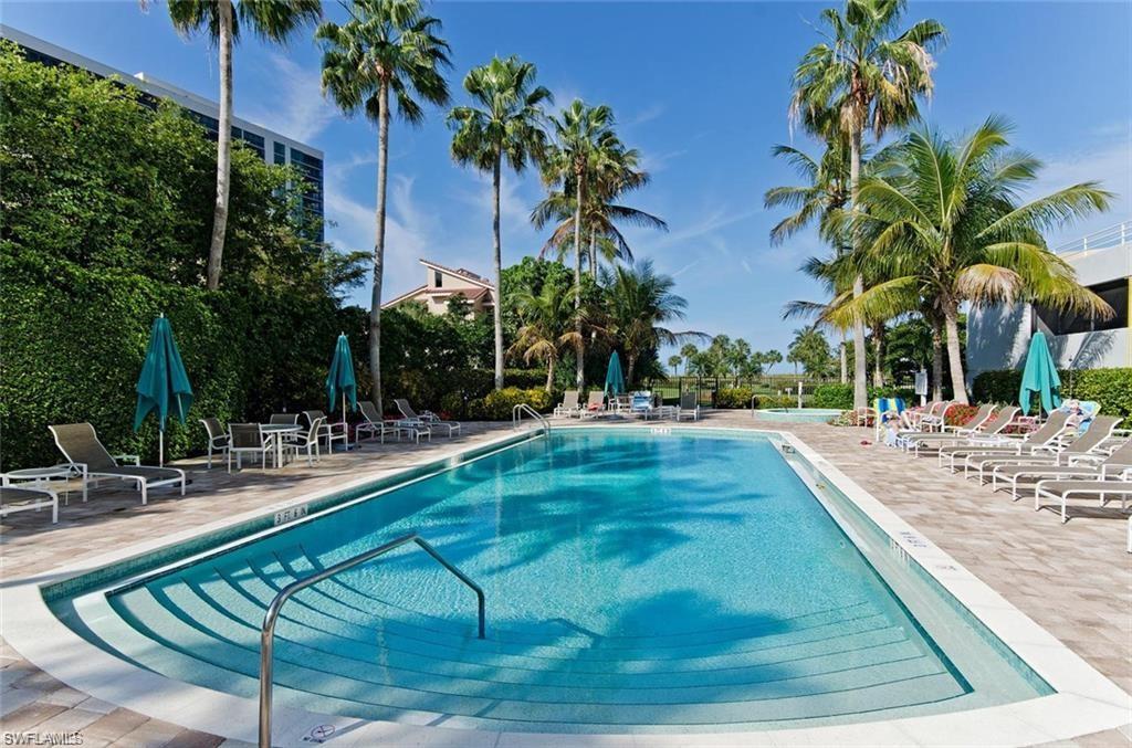 Community pool with a patio area