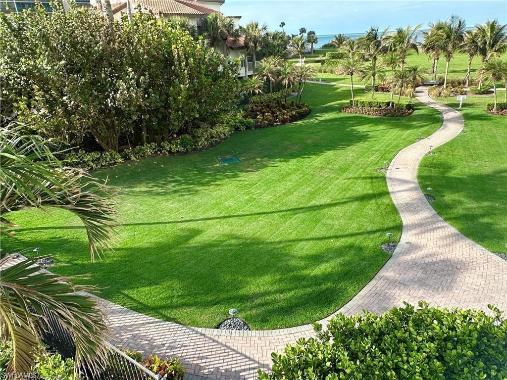 View of home's community featuring a lawn