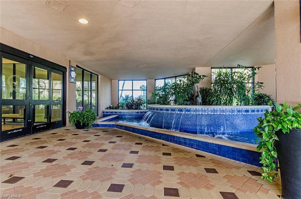 Entry Waterfall with Manager's Office to Right