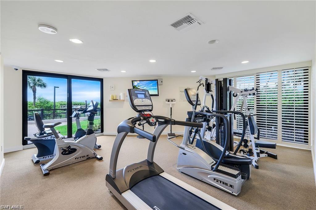 Gym featuring recessed lighting and carpet flooring