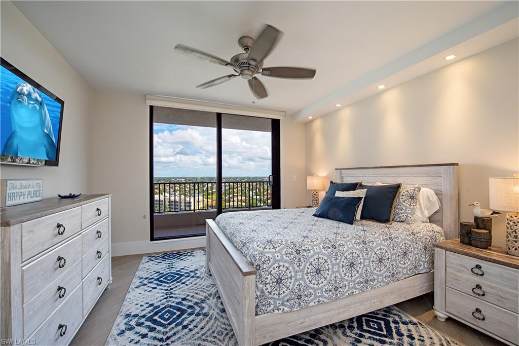 Third bedroom with King Size Mattress featuring floor to ceiling windows, access to outside, dark wood-type flooring, recessed lighting, and ceiling fan