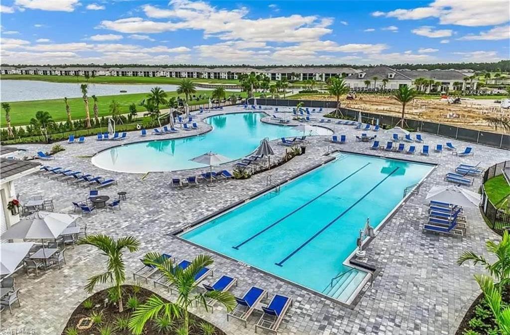 Community pool featuring a patio area